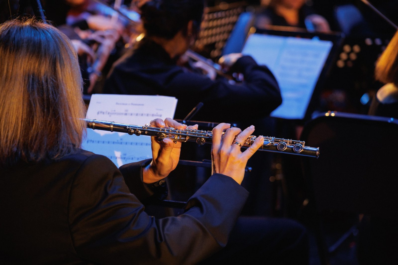 someone playing the flute in a choir